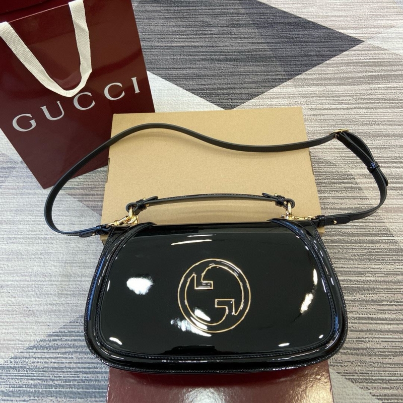 G*u*i top handle bags
